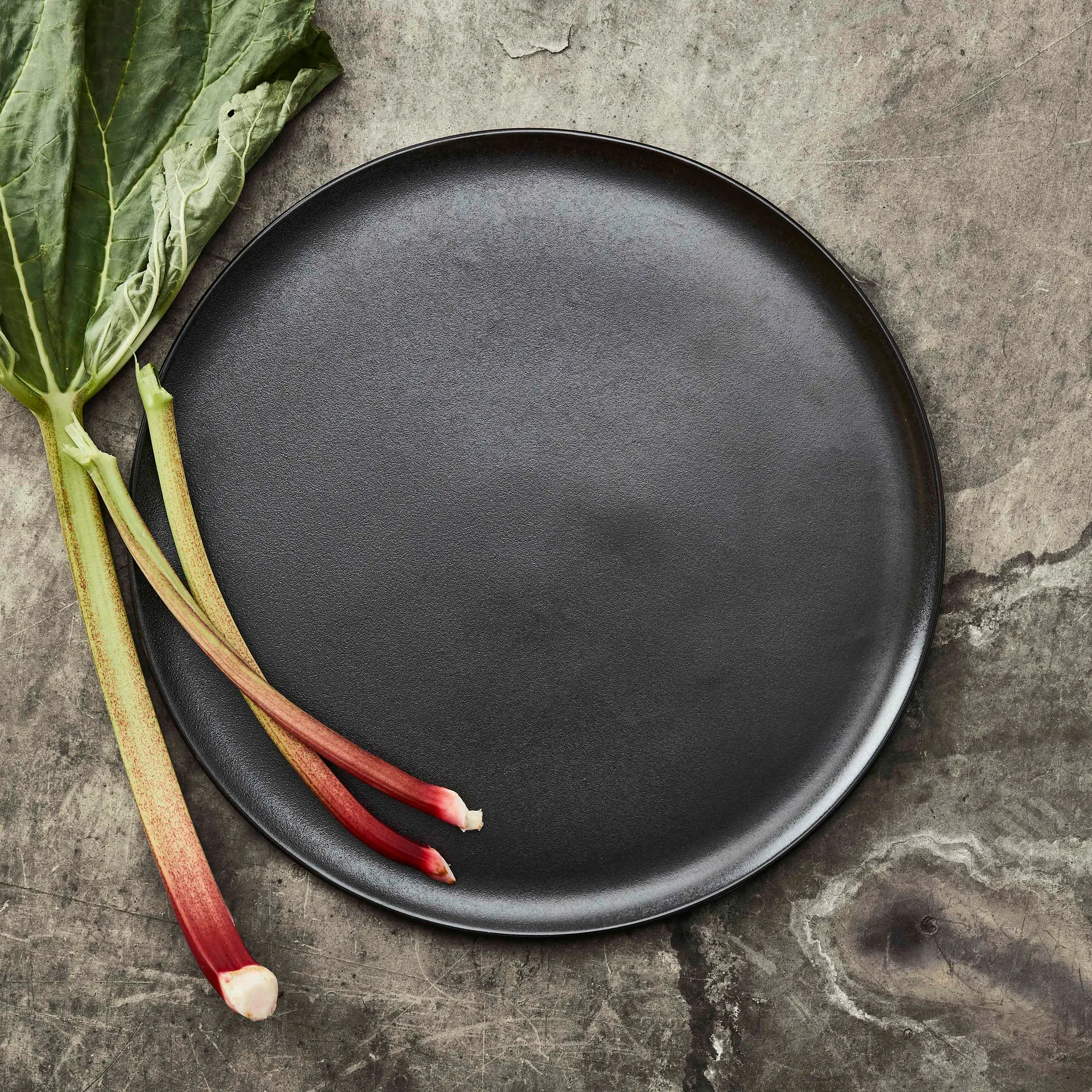 Piattino da portata Raw Ø 42 cm, Titanium Black Aida