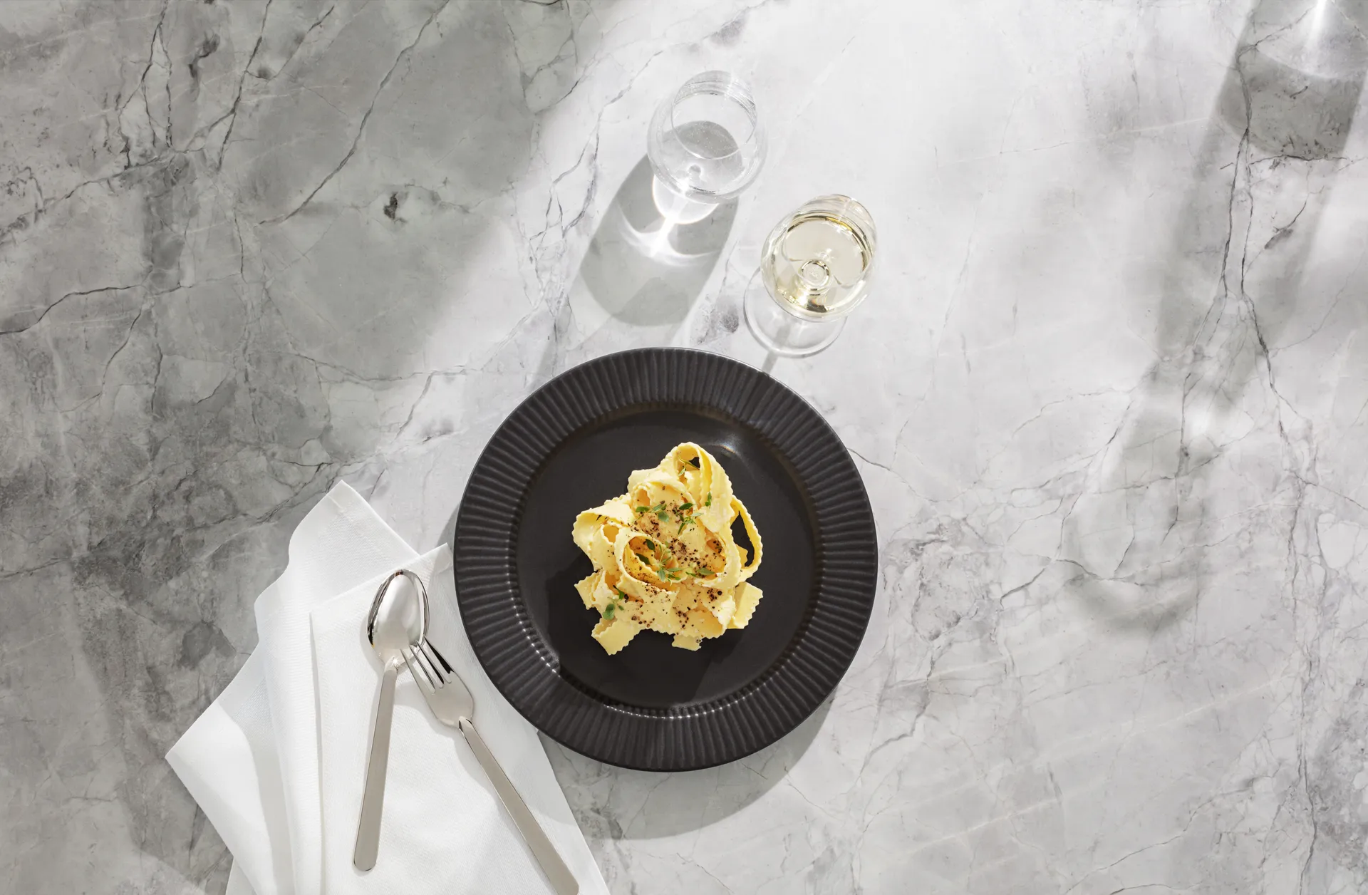 Piatto nero Eva Trio Legio Nova, Ø25 cm Eva Solo