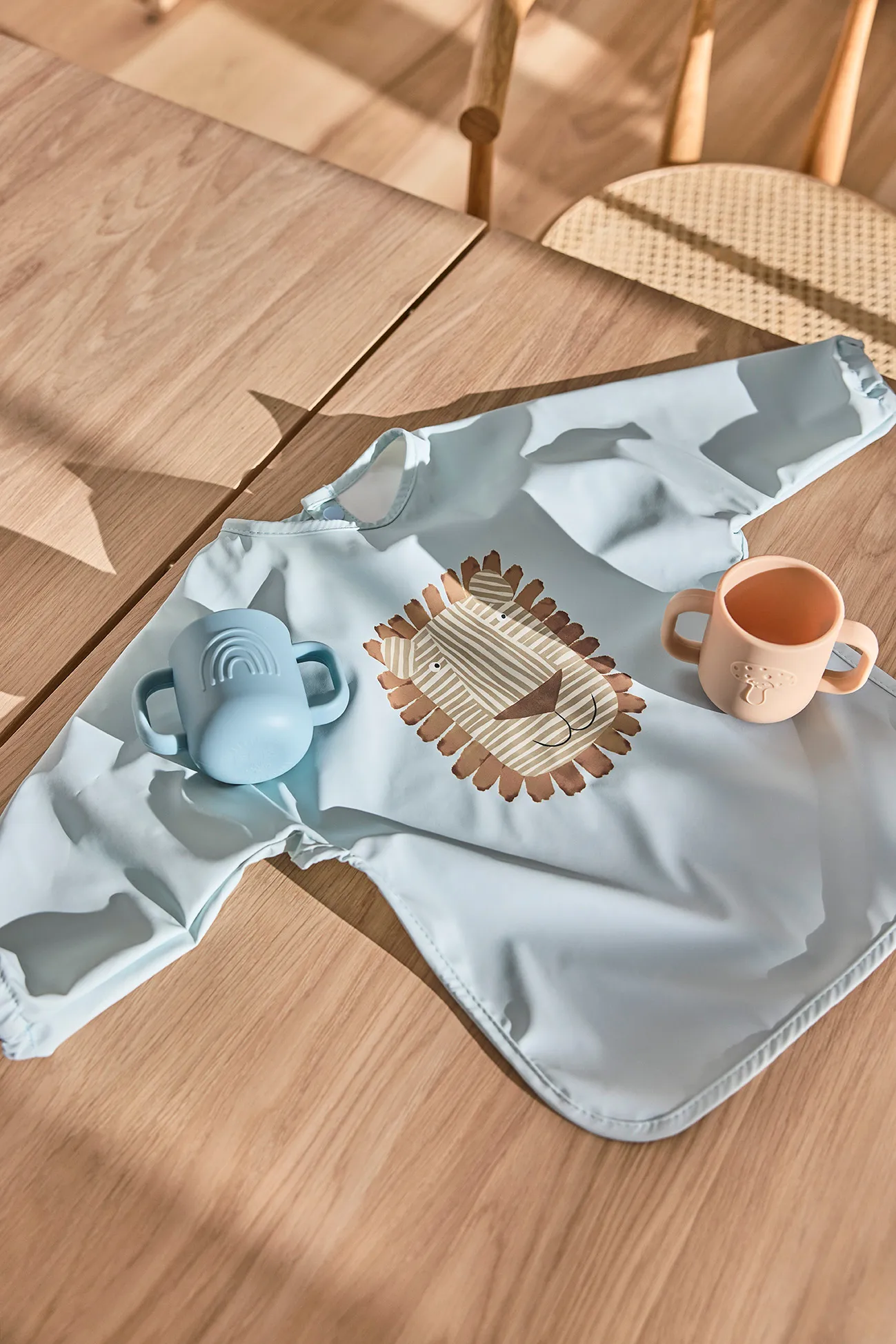 Bavaglino con manica Lobo Lion , Ice blue OYOY