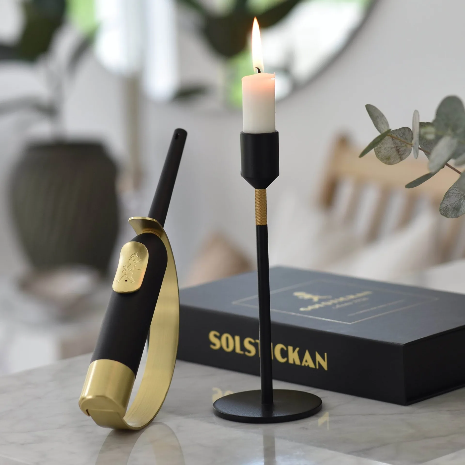 Solstickan accendino Eldklinga, Nero-ottone Solstickan Design