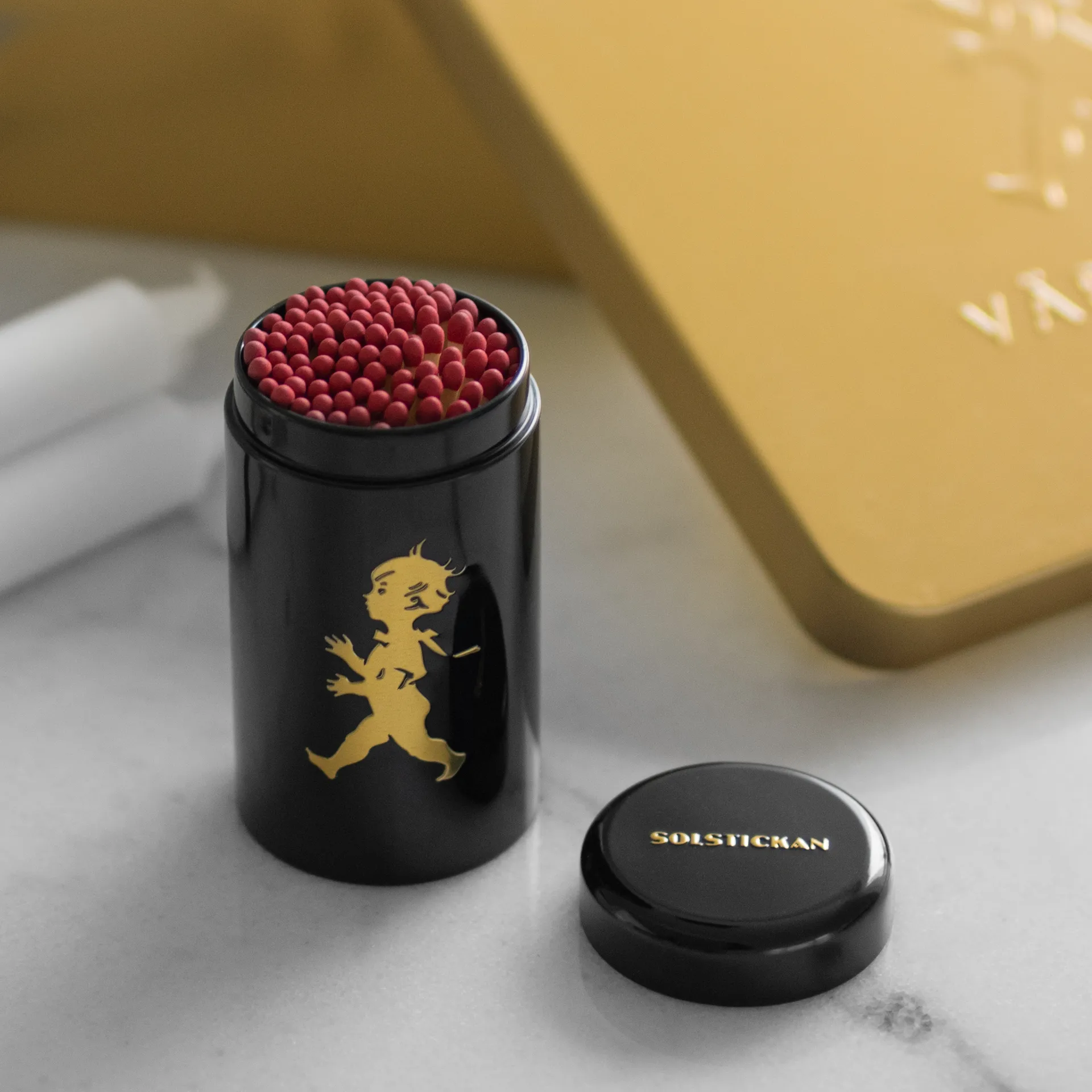 Tubo di fiammiferi Solstickan, 100 pezzi, Nero-oro Solstickan Design