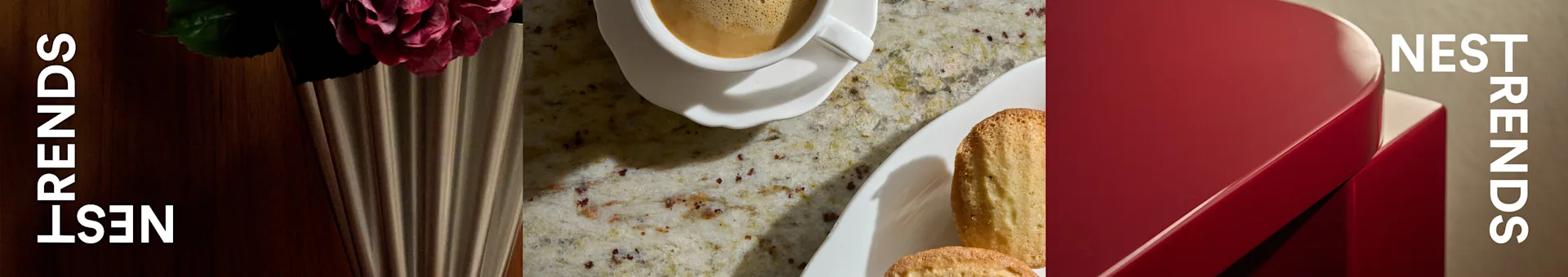 Tazza di caffè, madeleine e rosa in vaso scanalato su piano maculato, vicino a scatola rossa, con 'NEST TRENDS'.